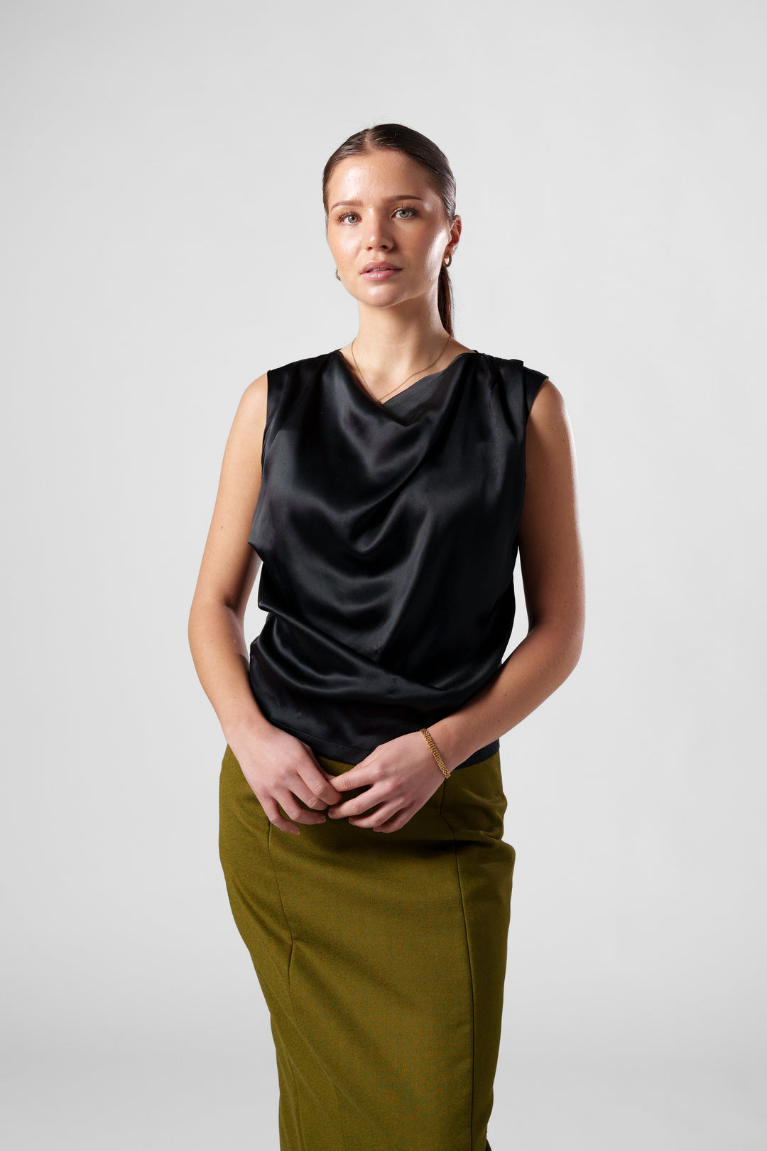 The Black Sleeveless Silk Shirt